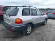 2002 Hyundai Santa Fe GLS with VIN KM8SC13D92U149292, listed as a IAAI auction lot 42894176 with 203,722 mi miles and . Bid and sale history available at DreamBid. Image 4.
