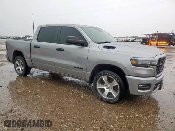 2025 Ram 1500 Tradesman with VIN 1C6RREGG0SN552320, listed as a Copart auction lot 62069545 with 29,302 mi miles and Salvage title. Bid and sale history available at DreamBid. Image 4.