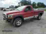 2006 Dodge 1500 SLT with VIN 1D7HU16206J244472, listed as a Copart auction lot 71201095 with 201,673 mi miles and Salvage title. Bid and sale history available at DreamBid. Image 1.