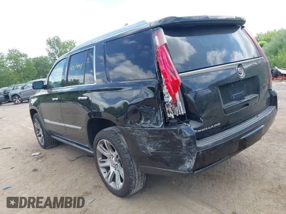 2015 Cadillac Escalade Premium z VIN 1GYS4CKJ9FR254258, wystawiony jako IAAI lot #42574409 z przebiegiem 129 511 mil mil oraz . Historia ofert i sprzedaży dostępna na DreamBid. Obrazek 3.