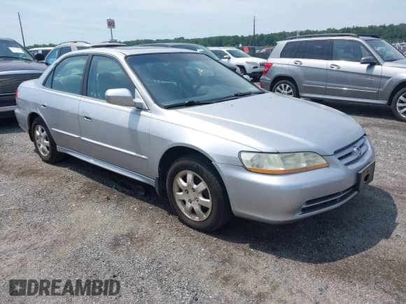 2002 Honda Accord EX with VIN 1HGCG56642A076174, listed as a IAAI auction lot 42819951 with 165,539 mi miles and . Bid and sale history available at DreamBid. Image 1.