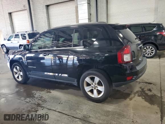 2014 Jeep Compass Sport with VIN 1C4NJDBB9ED842554, listed as a Copart auction lot 69468485 with 124,308 mi miles and Salvage title. Bid and sale history available at DreamBid. Image 2.