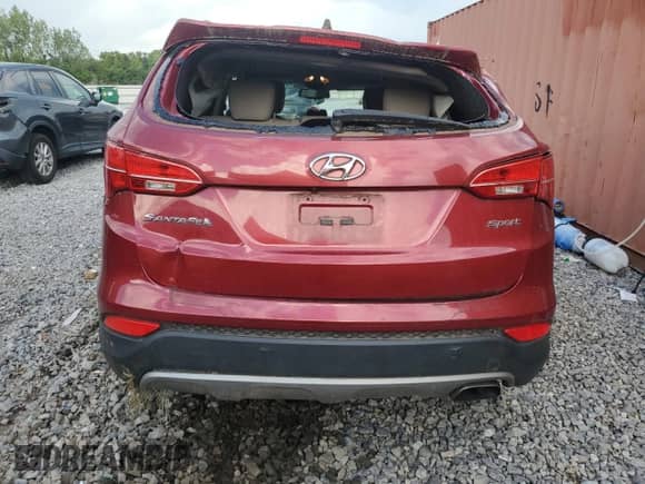 2016 Hyundai Santa Fe with VIN 5XYZU3LB1GG356956, listed as a Copart auction lot 69944795 with 72,117 mi miles and Salvage title. Bid and sale history available at DreamBid. Image 6.