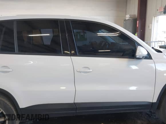 2013 Volkswagen Tiguan with VIN WVGCV3AX7DW605594, listed as a IAAI auction lot 42057457 with 131,629 mi miles and . Bid and sale history available at DreamBid. Image 13.