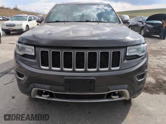 2016 Jeep Grand Cherokee Overland z VIN 1C4RJFCG6GC490047, wystawiony jako Copart lot #54076295 z przebiegiem 57 084 mil mil oraz Szkoda całkowita • Salvage title. Historia ofert i sprzedaży dostępna na DreamBid. Obrazek 5.