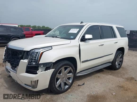 2015 Cadillac Escalade Luxury with VIN 1GYS3BKJ2FR210504, listed as a IAAI auction lot 42642236 with 150,392 mi miles and . Bid and sale history available at DreamBid. Image 2.