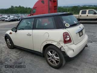2013 MINI Hardtop with VIN WMWSU3C50DT683566, listed as a Copart auction lot 59854505 with 136,288 mi miles and Salvage title. Bid and sale history available at DreamBid. Image 2.