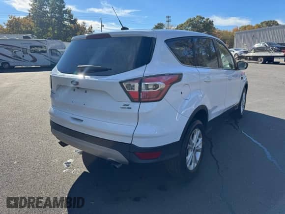 2017 Ford Escape SE с VIN 1FMCU9GD5HUB55836, выставлен на аукционе Copart как лот 89575825 с пробегом 136 775 миль миль и Чистый • Clean title. История ставок и продаж доступна на DreamBid. Изображение 3.