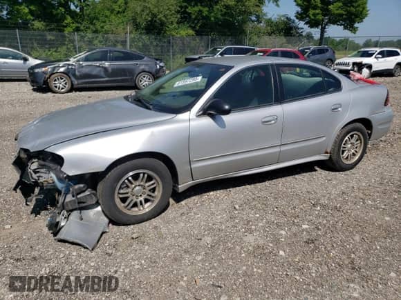2003 Pontiac Grand Am SE with VIN 1G2NE52F73C302849, listed as a Copart auction lot 61597295 with 94,732 mi miles and Clean title. Bid and sale history available at DreamBid. Image 1.