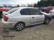 2004 Hyundai Accent GL z VIN KMHCG35C64U279929, wystawiony jako Copart lot #81661824 z przebiegiem 99 222 mil mil oraz Szkoda całkowita • Salvage title. Historia ofert i sprzedaży dostępna na DreamBid. Obrazek 3.