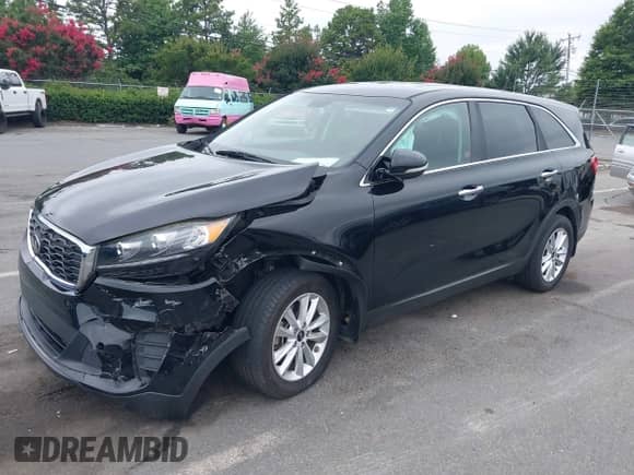 2019 Kia Sorento LX with VIN 5XYPG4A34KG503070, listed as a IAAI auction lot 42694219 with 131,184 mi miles and . Bid and sale history available at DreamBid. Image 17.