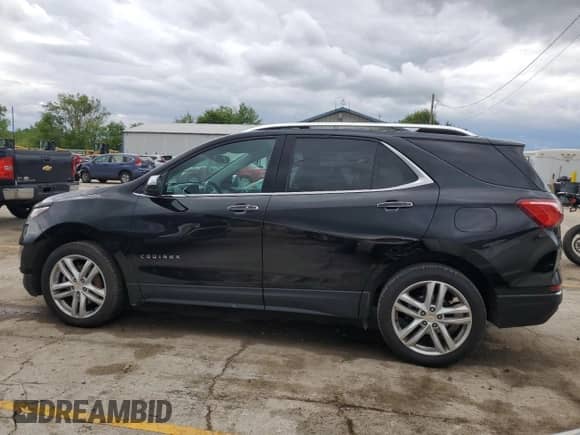 2020 Chevrolet Equinox Premier with VIN 2GNAXPEX3L6151108, listed as a Copart auction lot 58309105 with 174,687 mi miles and Salvage title. Bid and sale history available at DreamBid. Image 2.