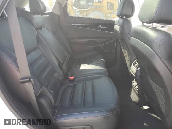 2016 Kia Sorento SXL z VIN 5XYPKDA54GG029984, wystawiony jako Copart lot #82266945 z przebiegiem 154 649 mil mil oraz Czysty tytuł • Clean title. Historia ofert i sprzedaży dostępna na DreamBid. Obrazek 11.