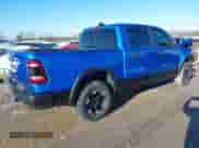 2022 Ram 1500 Rebel z VIN 1C6SRFLT0NN177124, wystawiony jako IAAI lot #41575076 z przebiegiem 40 065 mil mil oraz . Historia ofert i sprzedaży dostępna na DreamBid. Obrazek 4.