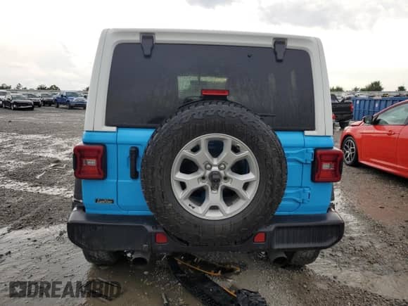2021 Jeep Wrangler Unlimited Sport with VIN 1C4HJXDN4MW628970, listed as a Copart auction lot 65211115 with 52,499 mi miles and Salvage title. Bid and sale history available at DreamBid. Image 6.