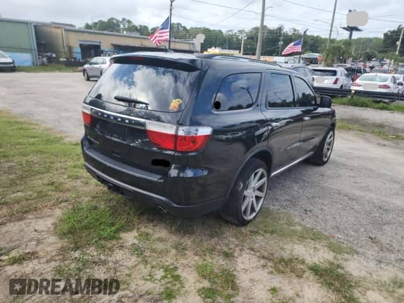 2013 Dodge Durango Crew z VIN 1C4SDHDT1DC697618, wystawiony jako Copart lot #85384105 z przebiegiem 141 879 mil mil oraz Czysty tytuł • Clean title. Historia ofert i sprzedaży dostępna na DreamBid. Obrazek 4.