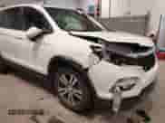 2018 Honda Pilot EX-L z VIN 5FNYF6H5XJB000904, wystawiony jako IAAI lot #43374737 z przebiegiem 166 130 mil mil oraz . Historia ofert i sprzedaży dostępna na DreamBid. Obrazek 19.