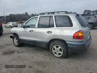 2002 Hyundai Santa Fe GLS z VIN KM8SC13D22U303504, wystawiony jako Copart lot #85939914 z przebiegiem 356 088 mil mil oraz Szkoda całkowita • Salvage title. Historia ofert i sprzedaży dostępna na DreamBid. Obrazek 2.