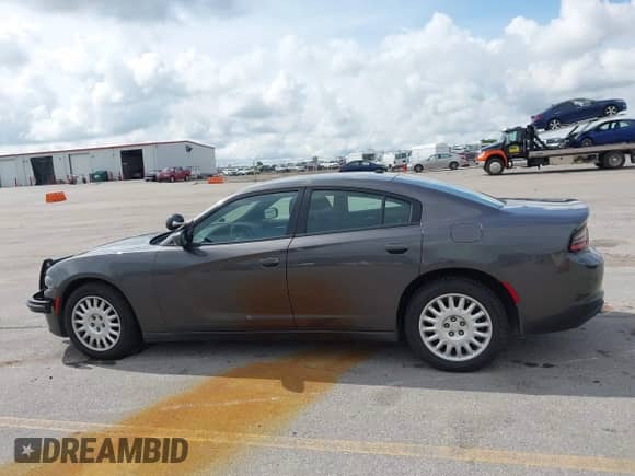 2020 Dodge Charger Police z VIN 2C3CDXKT4LH120180, wystawiony jako IAAI lot #42834441 z przebiegiem 128 459 mil mil oraz . Historia ofert i sprzedaży dostępna na DreamBid. Obrazek 14.