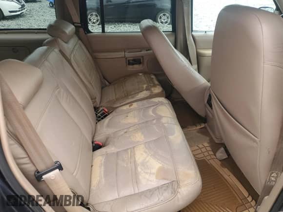 1999 Ford Explorer XLT with VIN 1FMDU34EXXZB35517, listed as a Copart auction lot 64431625 with 111,443 mi miles and Salvage title. Bid and sale history available at DreamBid. Image 10.