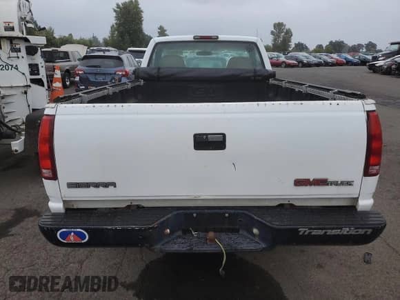 1997 GMC Sierra 1500 z VIN 1GTEK14W6VZ549578, wystawiony jako Copart lot #67808705 z przebiegiem 203 467 mil mil oraz Czysty tytuł • Clean title. Historia ofert i sprzedaży dostępna na DreamBid. Obrazek 6.