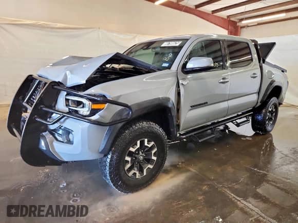 2021 Toyota Tacoma SR with VIN 5TFCZ5AN2MX251688, listed as a Copart auction lot 80790625 with 129,693 mi miles and Salvage title. Bid and sale history available at DreamBid. Image 1.
