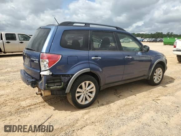 2011 Subaru Forester X Premium с VIN JF2SHADC9BG709453, выставлен на аукционе Copart как лот 56572155 с пробегом 145 359 миль миль и Списание • Salvage title. История ставок и продаж доступна на DreamBid. Изображение 3.