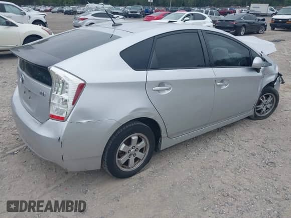 2011 Toyota Prius II with VIN JTDKN3DUXB1440569, listed as a IAAI auction lot 43240346 with 273,454 mi miles and . Bid and sale history available at DreamBid. Image 4.