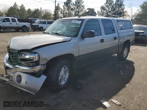 2004 GMC Sierra 1500 SLT with VIN 2GTEK13TX41356574, listed as a Copart auction lot 81002774 with 235,272 mi miles and Salvage title. Bid and sale history available at DreamBid. Image 1.