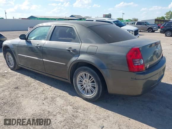 2009 Chrysler 300 LX with VIN 2C3KA43D89H505437, listed as a IAAI auction lot 43384105 with Not provided miles and . Bid and sale history available at DreamBid. Image 3.