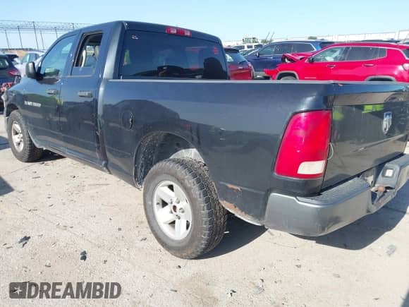 2011 Ram 1500 ST with VIN 1D7RB1GK5BS657713, listed as a IAAI auction lot 42266637 with 228,891 mi miles and . Bid and sale history available at DreamBid. Image 3.