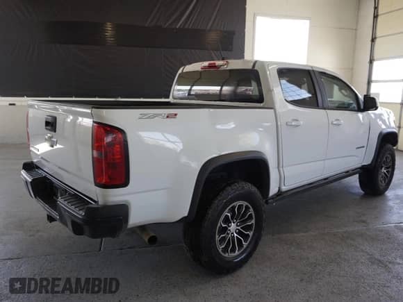 2020 Chevrolet Colorado 4WD ZR2 z VIN 1GCPTEE19L1134962, wystawiony jako Copart lot #80129764 z przebiegiem 143 005 mil mil oraz Szkoda całkowita • Salvage title. Historia ofert i sprzedaży dostępna na DreamBid. Obrazek 3.