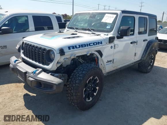 2024 Jeep Wrangler Rubicon with VIN 1C4RJXR60RW223430, listed as a IAAI auction lot 43343638 with 53,374 mi miles and . Bid and sale history available at DreamBid. Image 2.