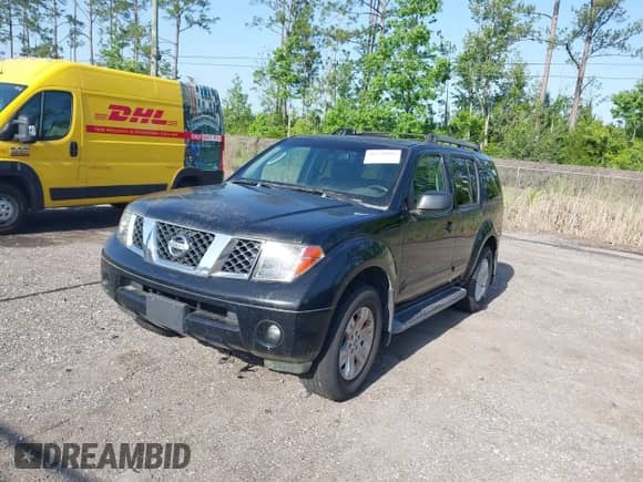 2005 Nissan Pathfinder SE with VIN 5N1AR18U25C729688, listed as a IAAI auction lot 42279502 with 164,626 mi miles and . Bid and sale history available at DreamBid. Image 2.