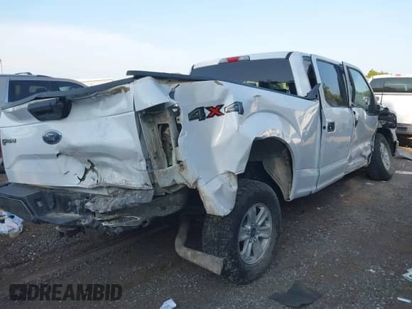 2017 Ford F-150 XLT with VIN 1FTFW1EG6HKD77811, listed as a IAAI auction lot 43137609 with 156,403 mi miles and . Bid and sale history available at DreamBid. Image 4.