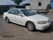 2001 Honda Accord EX with VIN JHMCG66801C007490, listed as a Copart auction lot 64178815 with 258,161 mi miles and Salvage title. Bid and sale history available at DreamBid. Image 4.