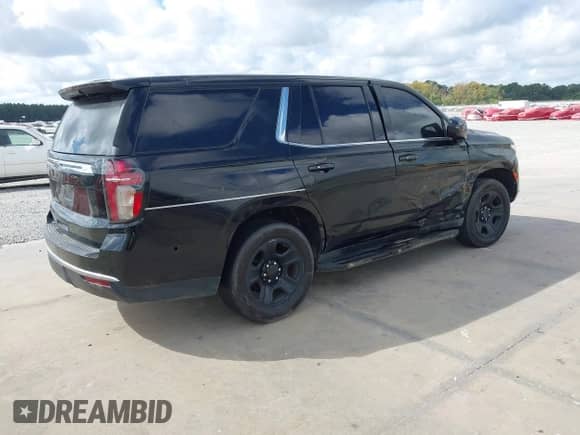 2021 Chevrolet Tahoe Commercial with VIN 1GNSCLED3MR307524, listed as a IAAI auction lot 43220890 with 58,961 mi miles and . Bid and sale history available at DreamBid. Image 4.
