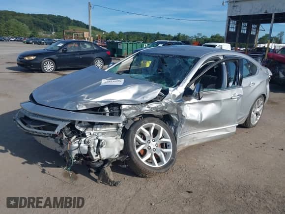 2018 Chevrolet Impala Premier z VIN 2G1125S3XJ9173740, wystawiony jako IAAI lot #43014022 z przebiegiem 95 383 mil mil oraz . Historia ofert i sprzedaży dostępna na DreamBid. Obrazek 6.