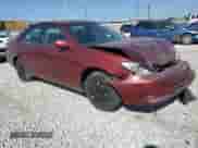 2002 Toyota Camry LE z VIN 4T1BE32K22U016251, wystawiony jako Copart lot #84827955 z przebiegiem 283 817 mil mil oraz Szkoda całkowita • Salvage title. Historia ofert i sprzedaży dostępna na DreamBid. Obrazek 4.