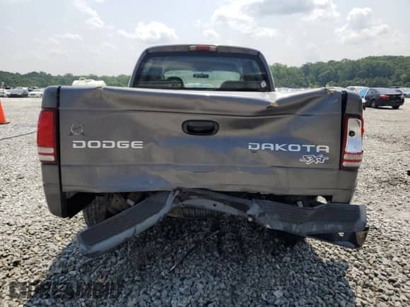 2003 Dodge Dakota Sport with VIN 1D7HL38X33S350007, listed as a Copart auction lot 59471835 with 222,406 mi miles and Salvage title. Bid and sale history available at DreamBid. Image 6.