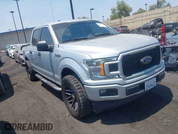 2018 Ford F-150 XL with VIN 1FTEW1CP1JKD34689, listed as a IAAI auction lot 42899519 with 127,980 mi miles and . Bid and sale history available at DreamBid. Image 1.