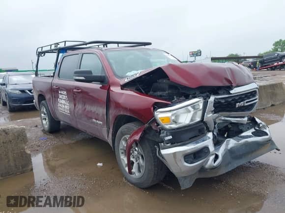 2022 Ram 1500 Big Horn z VIN 1C6RREFT4NN119974, wystawiony jako IAAI lot #42162712 z przebiegiem 123 724 mil mil oraz . Historia ofert i sprzedaży dostępna na DreamBid. Obrazek 1.