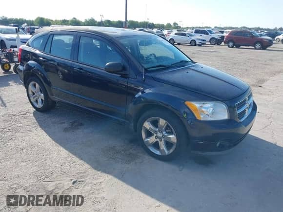 2011 Dodge Caliber Uptown with VIN 1B3CB9HBXBD172566, listed as a IAAI auction lot 41873076 with 120,752 mi miles and . Bid and sale history available at DreamBid. Image 1.