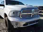 2014 Ram 1500 Laramie z VIN 1C6RR7NM3ES476697, wystawiony jako Copart lot #85137595 z przebiegiem 202 962 mil mil oraz Szkoda całkowita • Salvage title. Historia ofert i sprzedaży dostępna na DreamBid. Obrazek 14.