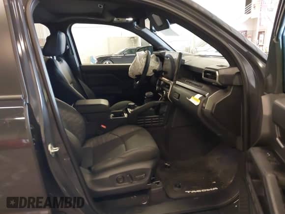 2024 Toyota Tacoma SR5 with VIN 3TMLB5JN9RM067351, listed as a IAAI auction lot 41529043 with 3,054 mi miles and . Bid and sale history available at DreamBid. Image 5.