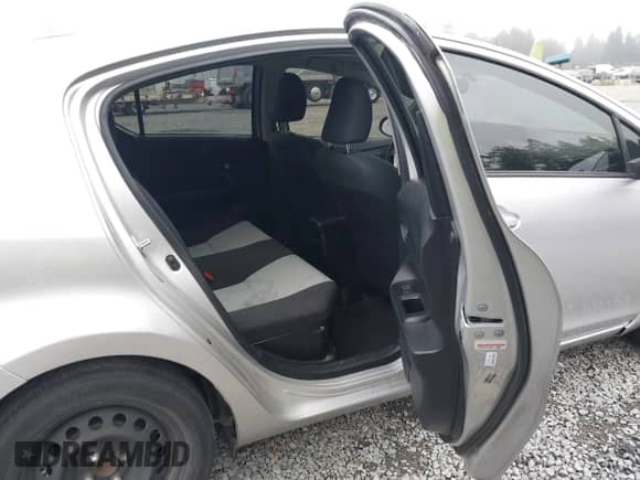 2015 Toyota Prius One z VIN JTDKDTB35F1577860, wystawiony jako IAAI lot #43206890 z przebiegiem 96 755 mil mil oraz . Historia ofert i sprzedaży dostępna na DreamBid. Obrazek 8.