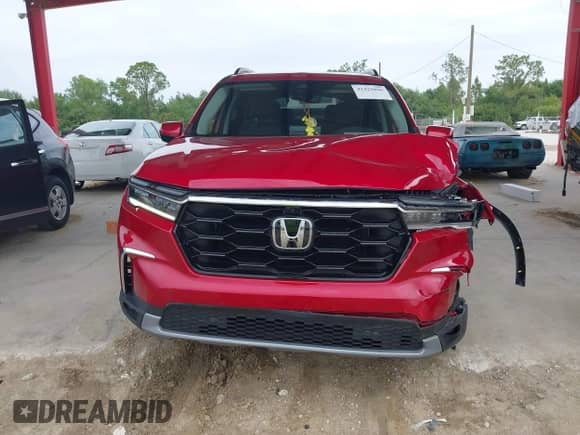 2023 Honda Pilot Elite z VIN 5FNYG1H84PB039720, wystawiony jako IAAI lot #42429896 z przebiegiem 37 988 mil mil oraz . Historia ofert i sprzedaży dostępna na DreamBid. Obrazek 12.