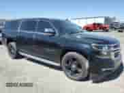 2015 Chevrolet Suburban LTZ с VIN 1GNSCKKC3FR542742, выставлен на аукционе Copart как лот 60916185 с пробегом 143 434 миль миль и Списание • Salvage title. История ставок и продаж доступна на DreamBid. Изображение 4.