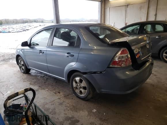 2007 Chevrolet Aveo LS z VIN KL1TD56697B119021, wystawiony jako Copart lot #67127784 z przebiegiem 178 885 mil mil oraz Szkoda całkowita • Salvage title. Historia ofert i sprzedaży dostępna na DreamBid. Obrazek 2.