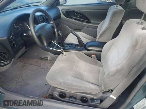 2000 Dodge Avenger with VIN 4B3AU42N1YE108358, listed as a Copart auction lot 84997885 with 215,963 mi miles and Salvage title. Bid and sale history available at DreamBid. Image 7.